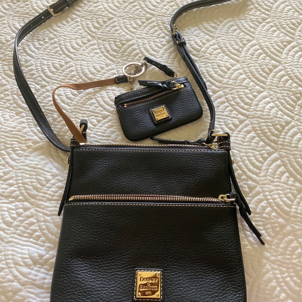 Used black Dooney and Bourke crossbody w/ wallet